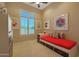 Bright bedroom with a daybed, built-in drawers, and large window at 3701 E Sat Nam Way, Cave Creek, AZ 85331