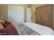 Well-lit bedroom with double door closet and built-in wardrobe at 3701 E Sat Nam Way, Cave Creek, AZ 85331