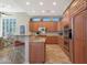 Gourmet kitchen boasting granite countertops and ample wood cabinetry at 3701 E Sat Nam Way, Cave Creek, AZ 85331