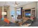 Bright and airy living room with a comfortable seating area and large windows at 3701 E Sat Nam Way, Cave Creek, AZ 85331