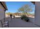 Brick patio with seating area and desert landscape views at 3701 E Sat Nam Way, Cave Creek, AZ 85331