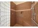 Walk-in shower with built-in seat and dual shower heads at 3701 E Sat Nam Way, Cave Creek, AZ 85331