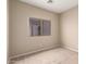 Bedroom with window and neutral colored carpet at 42414 N 46Th Ln, Phoenix, AZ 85086