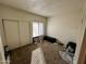 Bright bedroom with carpet and ample closet space at 9209 N 59Th Ave # 105, Glendale, AZ 85302