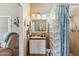Updated bathroom with glass block shower and vanity at 1045 E Cloud Rd, Phoenix, AZ 85086