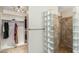 Modern bathroom with a walk-in shower and closet at 1045 E Cloud Rd, Phoenix, AZ 85086