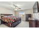 Large bedroom with a comfy bed and dark wood dresser at 1045 E Cloud Rd, Phoenix, AZ 85086