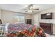 Comfortable bedroom with a king-size bed and dresser at 1045 E Cloud Rd, Phoenix, AZ 85086