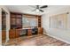 Home office features built-in shelving and wood desk at 1045 E Cloud Rd, Phoenix, AZ 85086