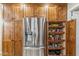 Kitchen pantry with ample shelving and stainless steel fridge at 1045 E Cloud Rd, Phoenix, AZ 85086