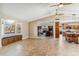 Open floor plan connecting living room, kitchen, and dining area at 1045 E Cloud Rd, Phoenix, AZ 85086