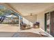 Covered patio with seating and adjacent pool area at 1045 E Cloud Rd, Phoenix, AZ 85086