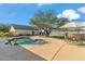 Spacious pool area with patio furniture and large shade umbrella at 1045 E Cloud Rd, Phoenix, AZ 85086