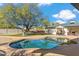 Inviting kidney-shaped pool with surrounding patio and seating area at 1045 E Cloud Rd, Phoenix, AZ 85086
