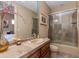 Bathroom with a shower/tub combo and wood vanity at 10542 E Skinner Dr, Scottsdale, AZ 85262