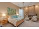 Main bedroom with fireplace and sitting area at 10542 E Skinner Dr, Scottsdale, AZ 85262