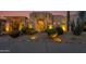 Stunning desert front elevation at dusk at 10542 E Skinner Dr, Scottsdale, AZ 85262