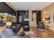 Gathering room with stone fireplace and leather furniture at 10542 E Skinner Dr, Scottsdale, AZ 85262