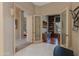 Bright home office features built-in shelving and hardwood floors at 10542 E Skinner Dr, Scottsdale, AZ 85262