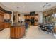 Gourmet kitchen with island and breakfast nook at 10542 E Skinner Dr, Scottsdale, AZ 85262