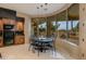 Breakfast nook with scenic views from large windows at 10542 E Skinner Dr, Scottsdale, AZ 85262