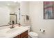 Small bathroom with toilet and vanity at 12671 W Dale Ln, Peoria, AZ 85383