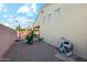 Landscaped backyard with gravel and a storage shed at 14444 W Moccasin Trl, Surprise, AZ 85374