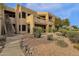 Condo building exterior with walkway and landscaping at 14645 N Fountain Hills Blvd # 114, Fountain Hills, AZ 85268