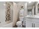 Clean bathroom with bathtub, shower, and modern vanity at 17850 N 68Th St # 3027, Phoenix, AZ 85054