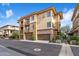 Three-story building with multiple garages and landscaping at 17850 N 68Th St # 3027, Phoenix, AZ 85054