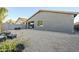 Spacious backyard with gravel and seating area at 1792 W Loemann Dr, San Tan Valley, AZ 85144