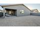 Large backyard with gravel landscaping and covered patio at 1792 W Loemann Dr, San Tan Valley, AZ 85144