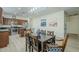 Kitchen dining area with dark wood table and chairs at 1792 W Loemann Dr, San Tan Valley, AZ 85144