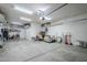 Garage with overhead storage and workbench at 1792 W Loemann Dr, San Tan Valley, AZ 85144