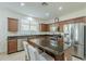 Modern kitchen with stainless steel appliances and granite countertops at 1792 W Loemann Dr, San Tan Valley, AZ 85144