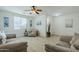 Bright living room featuring light flooring and comfy seating at 1792 W Loemann Dr, San Tan Valley, AZ 85144