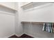 Large walk-in closet with double hanging rods at 18242 N 170Th Ln, Surprise, AZ 85374