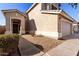 Front view of two story house with walkway and landscaping at 18242 N 170Th Ln, Surprise, AZ 85374