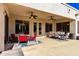 Outdoor patio area with seating and ceiling fans at 2169 E Leo Pl, Chandler, AZ 85249