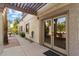 Outdoor patio with pergola, seating area, and lush landscaping at 24218 N 85Th St, Scottsdale, AZ 85255