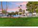 Landscaped backyard oasis with a pool and patio at 24218 N 85Th St, Scottsdale, AZ 85255