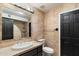 Clean bathroom with a toilet, sink, and dark wood vanity at 24218 N 85Th St, Scottsdale, AZ 85255