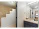 Guest bathroom with a step-in shower and dark vanity at 24218 N 85Th St, Scottsdale, AZ 85255