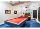 Game room includes a pool table and comfortable seating at 24218 N 85Th St, Scottsdale, AZ 85255