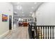 Bright interior hallway with hardwood floors and staircase at 24218 N 85Th St, Scottsdale, AZ 85255