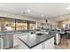Updated kitchen, island with sink, stainless steel appliances at 24218 N 85Th St, Scottsdale, AZ 85255