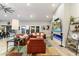 Spacious living room with fireplace and large TV at 24218 N 85Th St, Scottsdale, AZ 85255