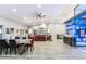 Open living space featuring a home theatre and wet bar at 24218 N 85Th St, Scottsdale, AZ 85255