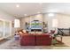 Open living area with fireplace and large screen TV at 24218 N 85Th St, Scottsdale, AZ 85255