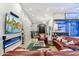 Spacious living room with sectional sofa and wine bar at 24218 N 85Th St, Scottsdale, AZ 85255